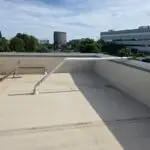 improper sewer vent on commercial roof