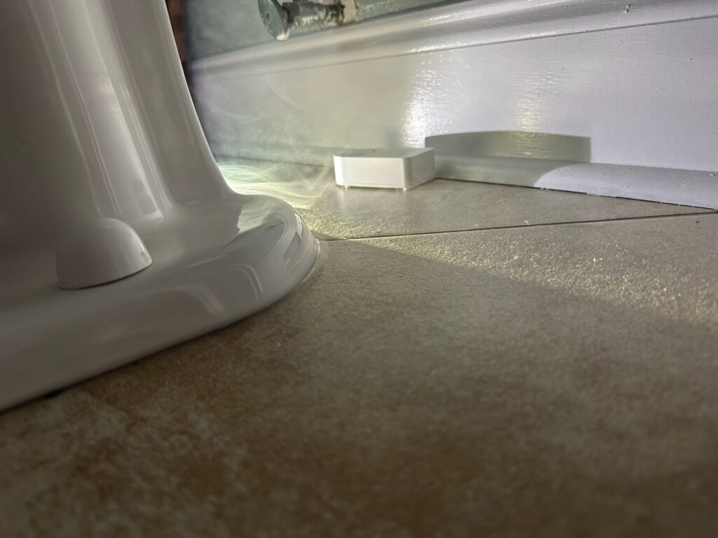 Smoke testing used to trace a sewer odor at a toilet