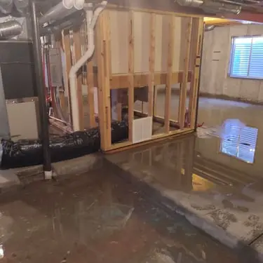 Leak Detection being performed in a flooded basement